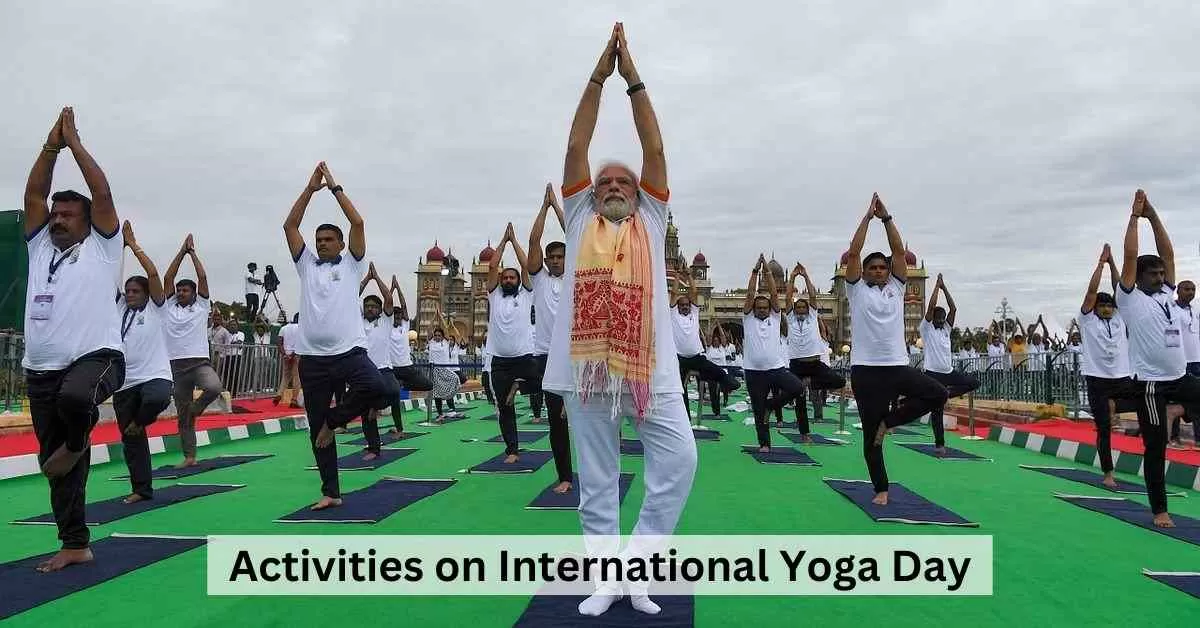 International Yoga Day event with participants doing yoga at Times Square, New York.