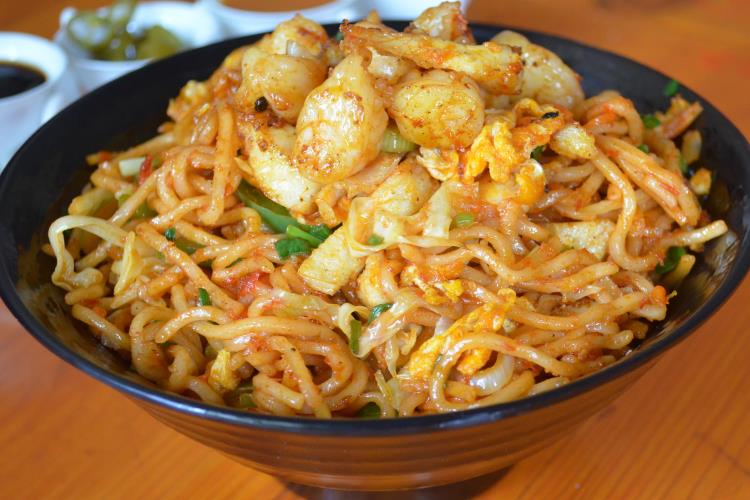 Fiery stir-fried Chilli Garlic Noodles with crispy vegetables 