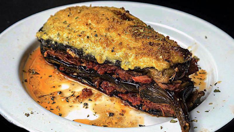 A freshly baked moussaka with golden béchamel topping