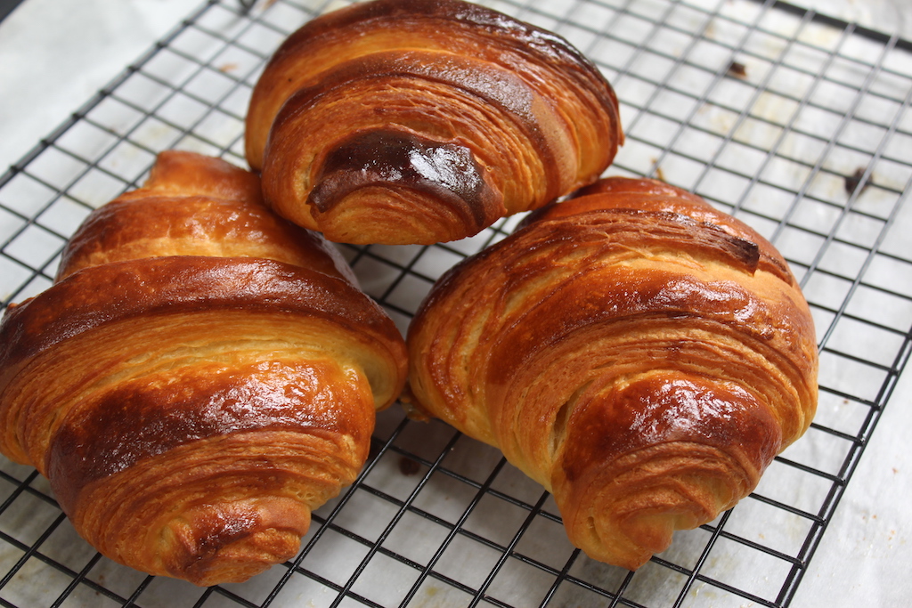 Golden, flaky croissant with buttery layers